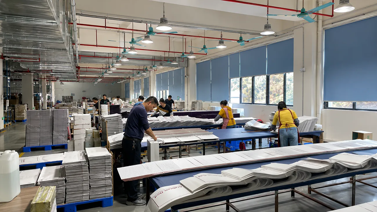 Crown Win factory workshop assembling custom cosmetic gift boxes on production line