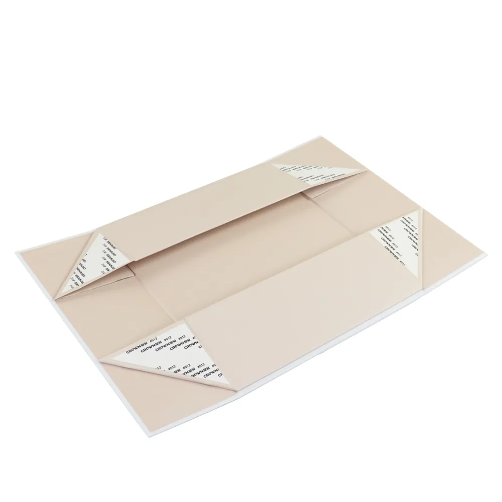 Closed assembled blush one piece folding box, minimalist white trim border foldable wedding favor packaging