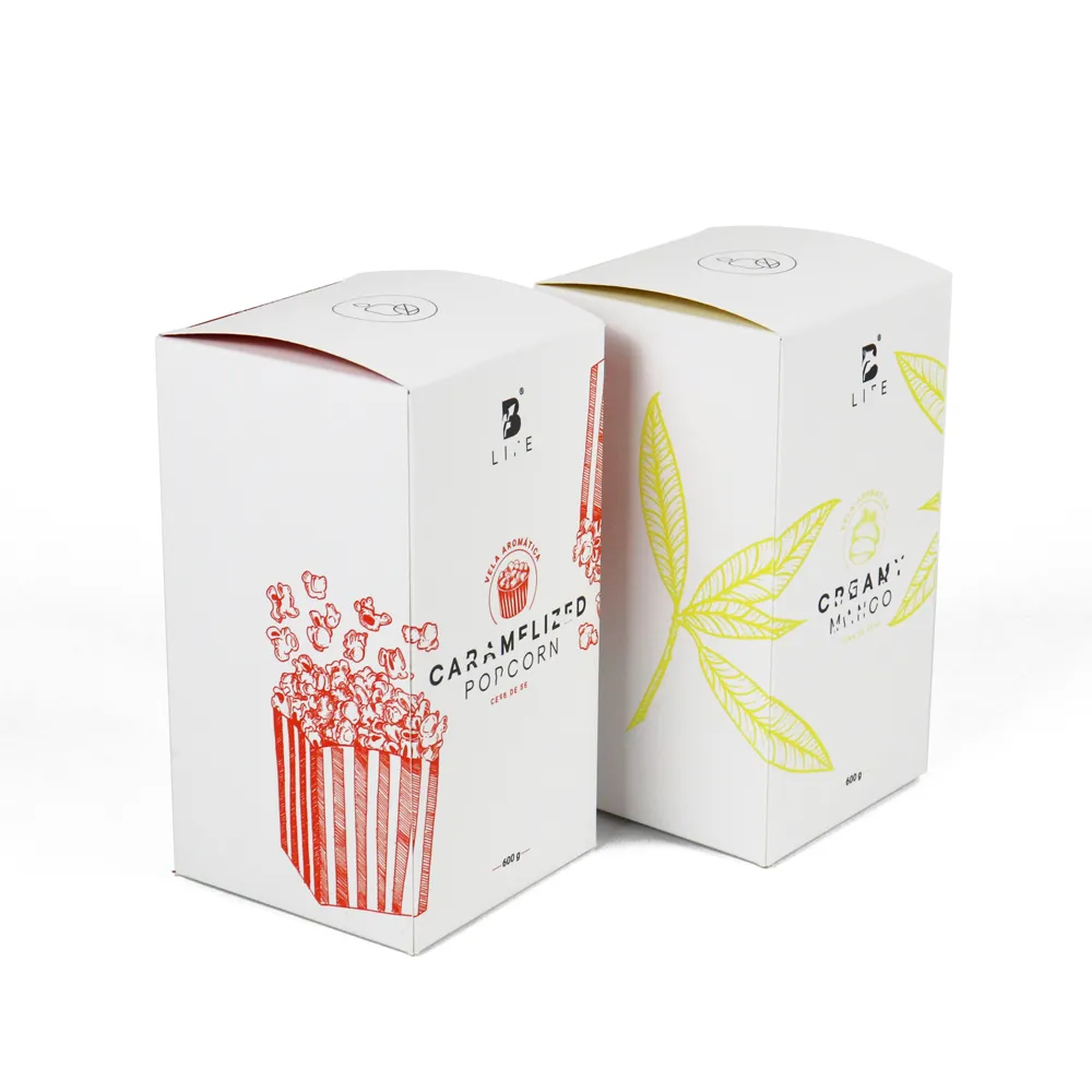 Angled open view of vertical tuck box with red interior printing, premium packaging for soy massage candles