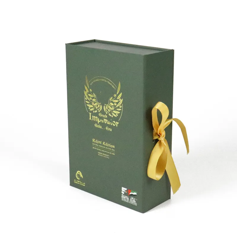 Slanted overhead view of dark green magnetic closure boxes, upscale rigid packaging for gourmet food gift sets