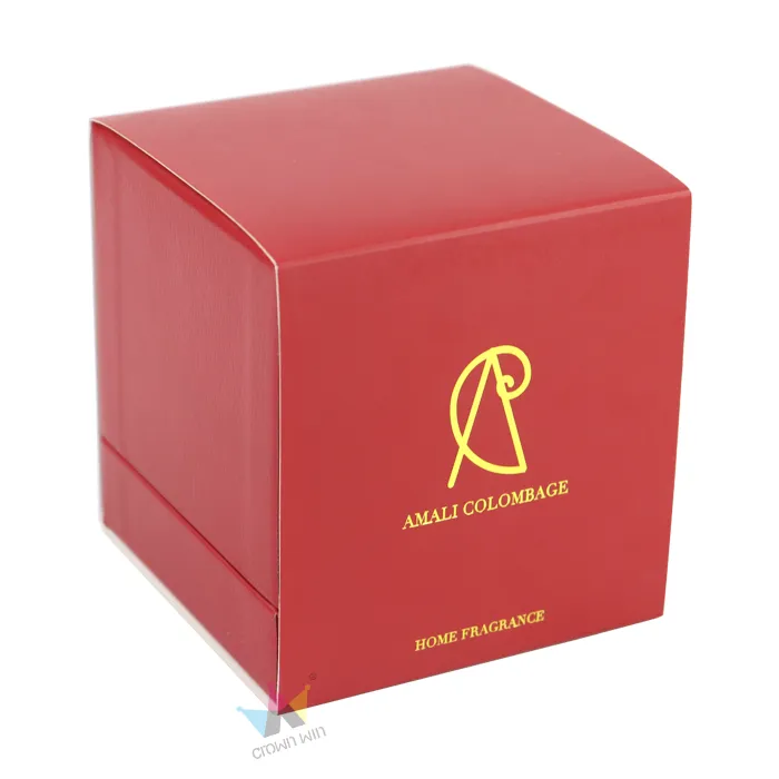 Front close-up of red rigid candle box featuring shiny custom gold hot foil logo and home fragrance text printing