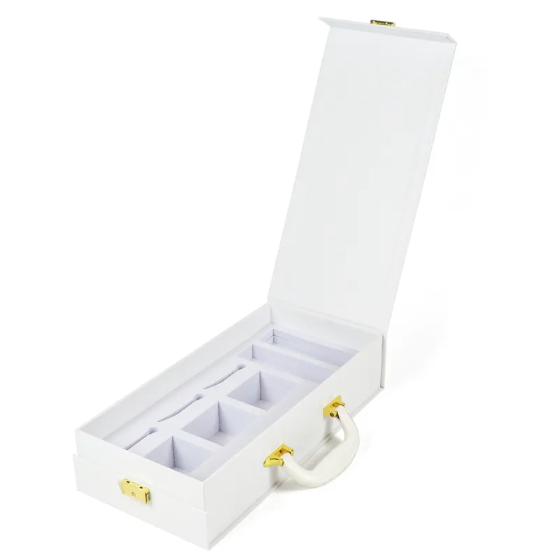 Close-up of golden metal latch hardware fitted on rigid white magnetic closure boxes