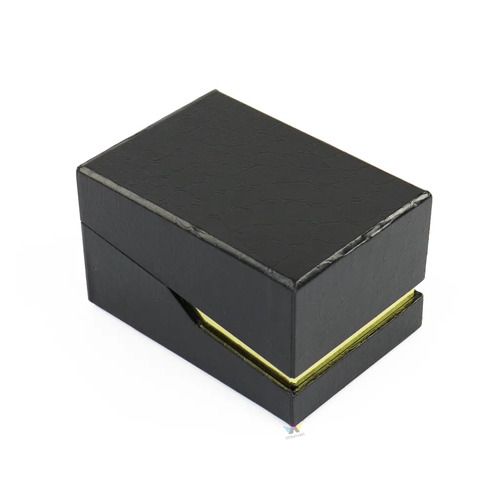 Removable plush black velvet insert detached from gold metallic tray for black PU leather essential oil packaging
