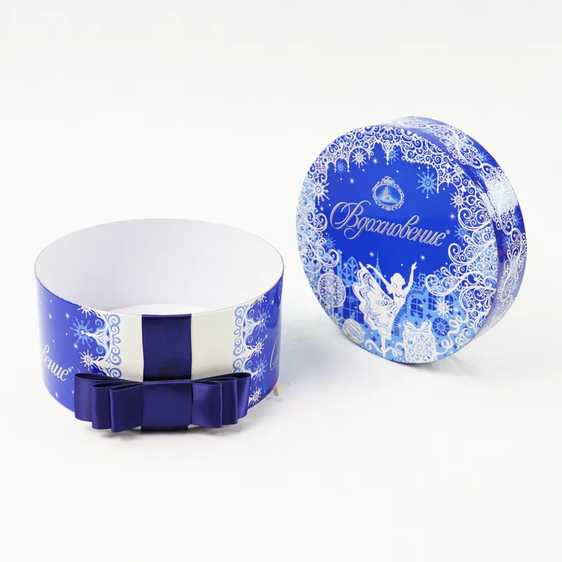 Side display of two styles holiday cylinder boxes, gold edged lid tube and ribbon bow paper tube
