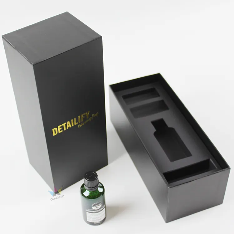 Empty precision multi-cavity molded EVA foam insert inside tall lid and base box packaging