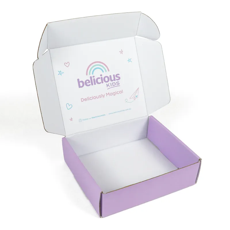 Empty fully open mailer tuck folding cartons showing cute rainbow star heart interior artwork, recyclable cosmetic gift tuck folding cartons