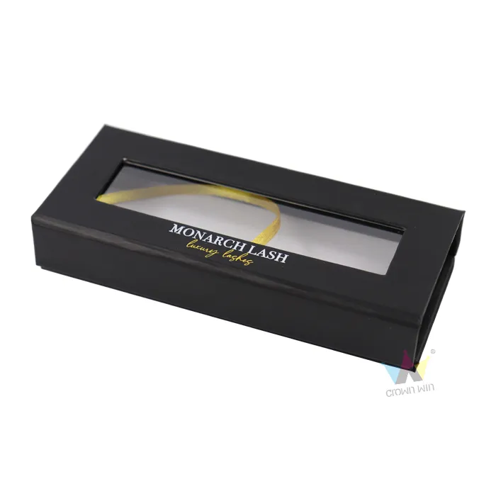Slanted display of two custom printed long black window box packaging sets for cosmetic eyelash retail