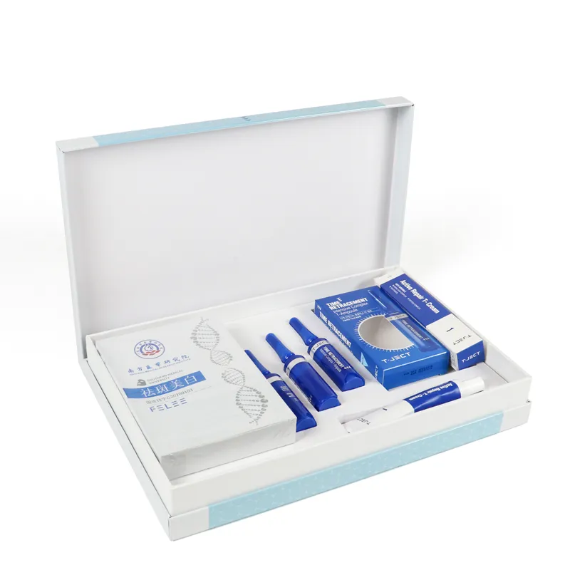 Flat lay presentation of branded rigid skincare packaging designed for combined ampoule, mask and serum cosmetic sets