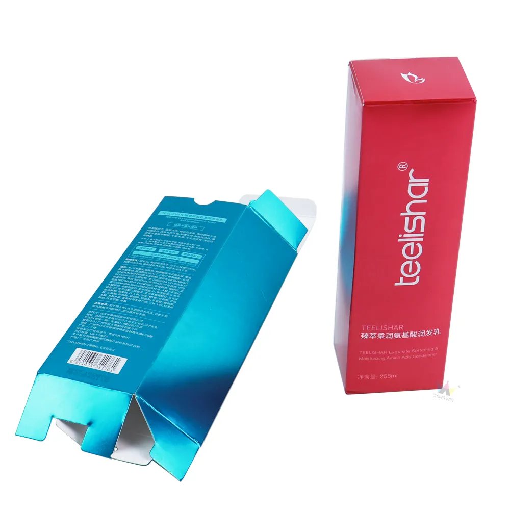 Flat unassembled cyan metallic tuck folding cartons showing back ingredient text and product barcode for shampoo packaging