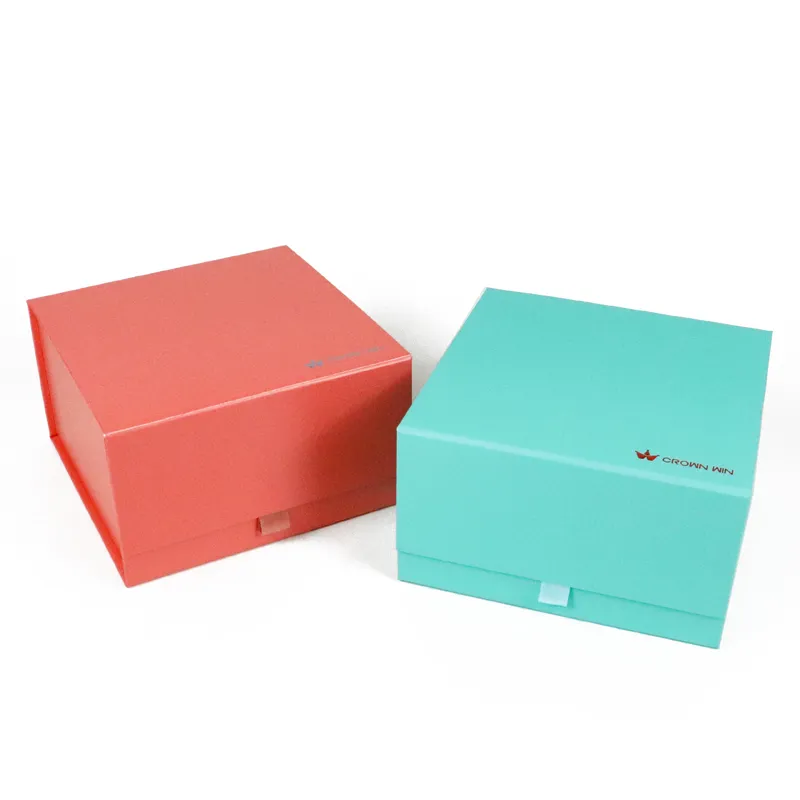 Three-quarter front view of solid matte one piece folding magnetic gift box with foil printed logo