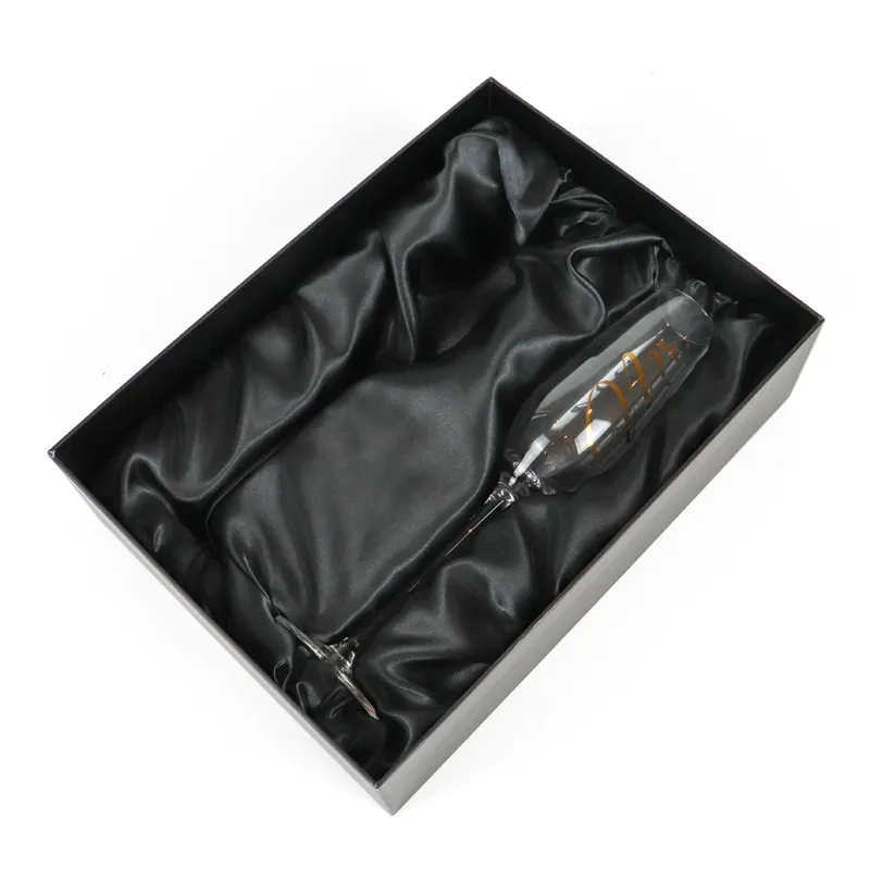 Closed front view matte black lid and base box with luxury gold crest logo printing for glass gifts