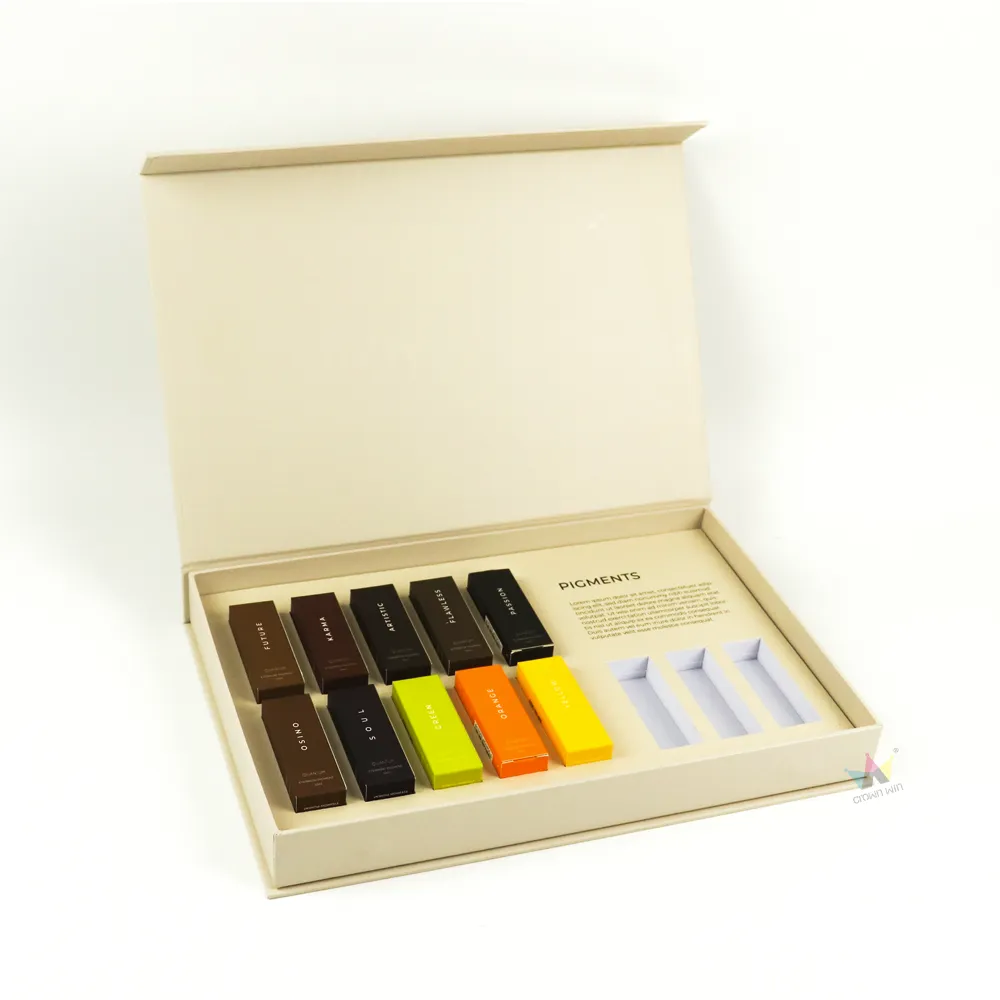 Full open display of luxury cosmetic boxes with neatly arranged pigment tubes inside custom compartment divider tray