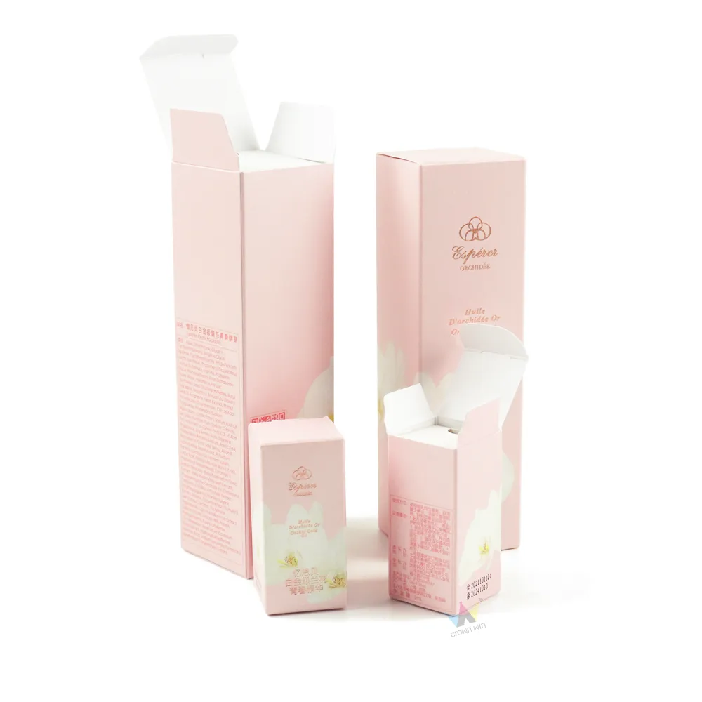 Fully opened large and mini pink orchid tuck folding cartons, recyclable custom foil printed skincare serum packaging cartons