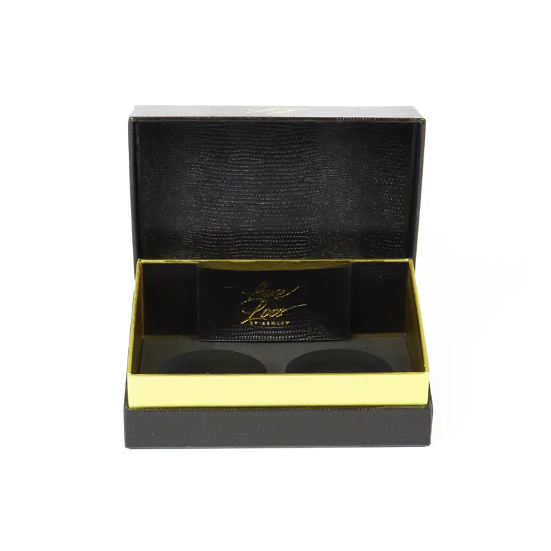 Fully opened magnetic rigid gift box with matching lizard grain lid lining and branded gold foil paper tag inside magnetic closure boxes