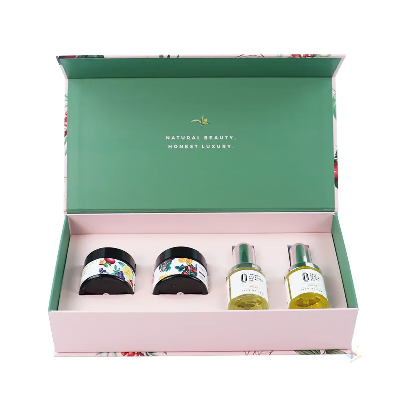 Fully open magnetic skincare packaging gift box loaded with two cream jars and two facial serum oil bottles in molded paper insert