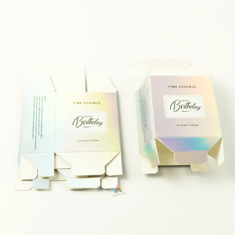 Display set of folded and unfolded holographic tuck box, lightweight foldable cosmetic packaging for serums and essential oils