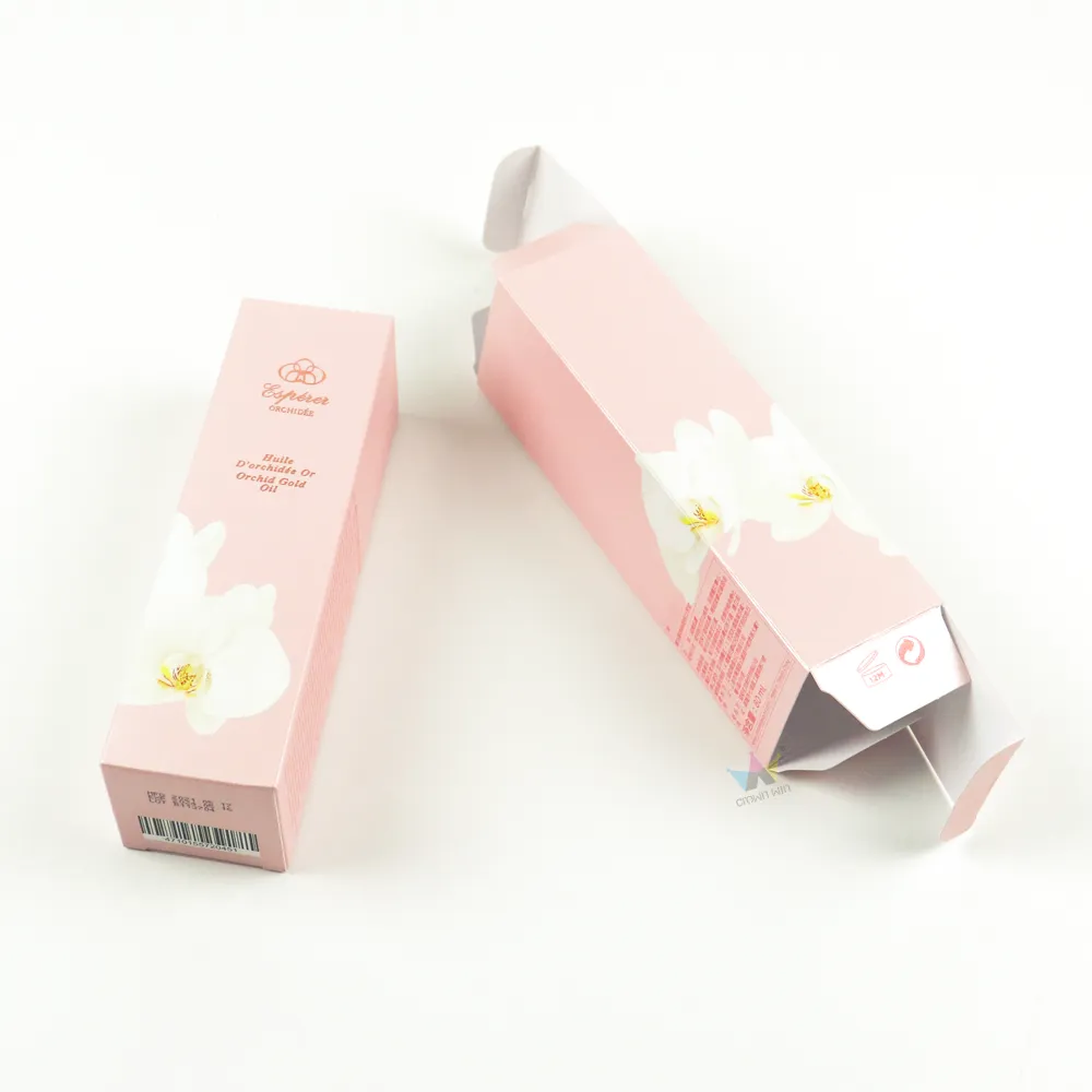 Opened auto lock bottom tuck folding cartons with white orchid CMYK graphics, recyclable skincare oil cosmetic carton boxes