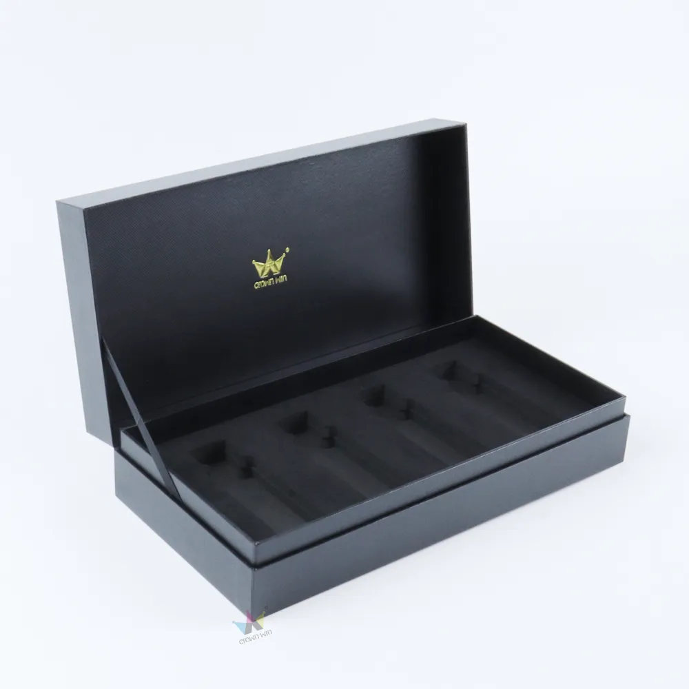 Open textured black magnetic lid essential oil boxes, full interior view showing pre-molded 4-slot high density black EVA foam insert