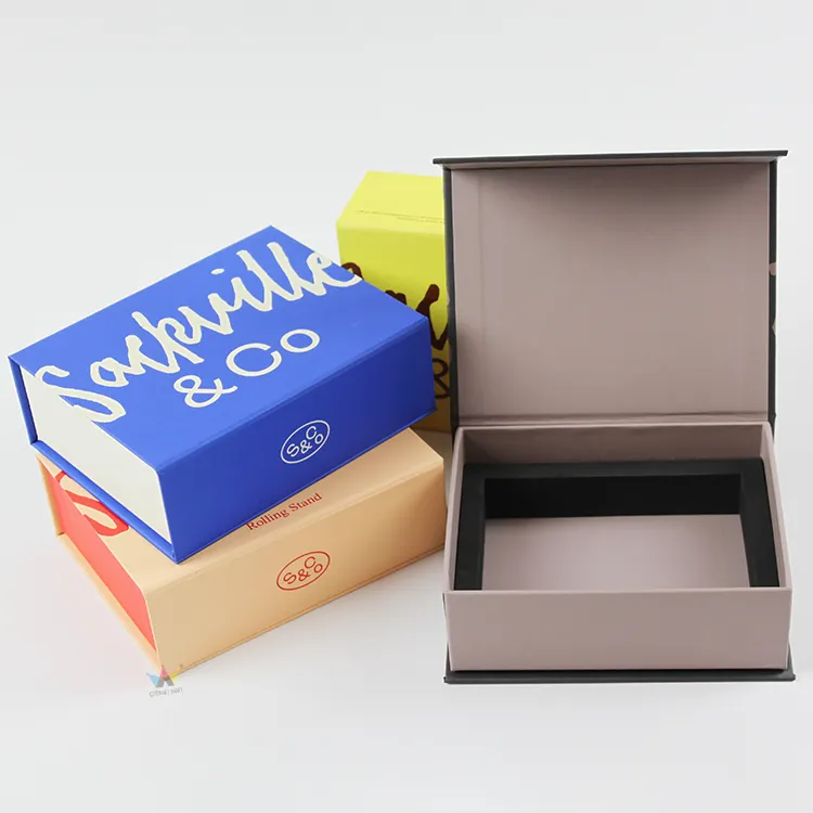 Open blue custom printed magnetic box with precision molded black EVA foam insert for product storage