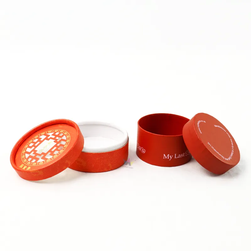 Opened cylinder boxes with window lid, showing clean white inner lining of short paper tube container