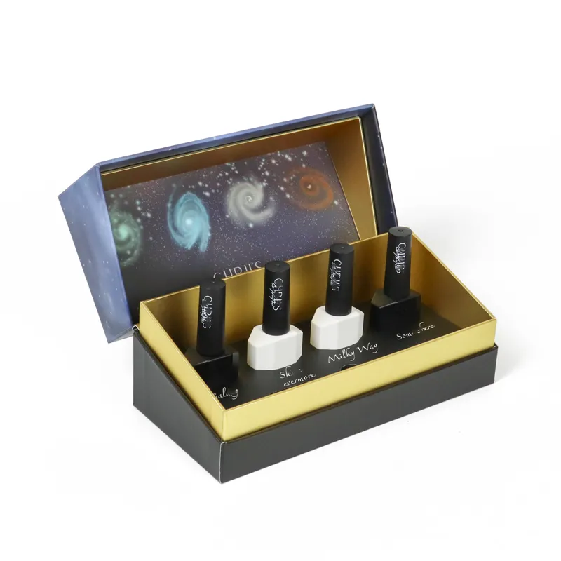 Opened starry sky printed magnetic closure boxes, luxury nail polish gift box with golden inner lining and nail gel bottles