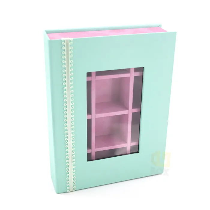 Side open shot of pastel mint magnetic window box packaging displaying removable paper divider and full hollow interior base