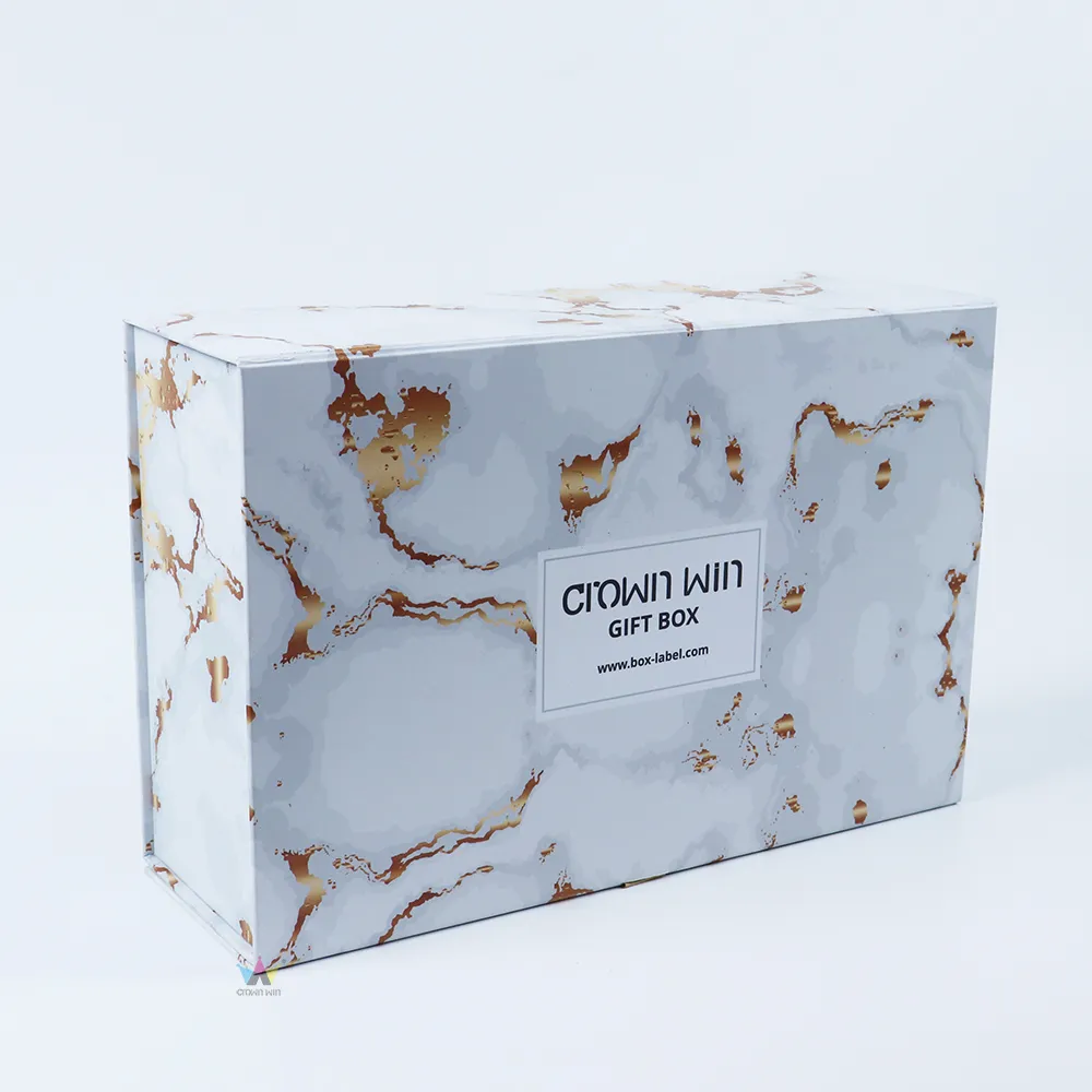 Top overhead view of empty interior compartment inside marble printed rigid one-piece folding gift box