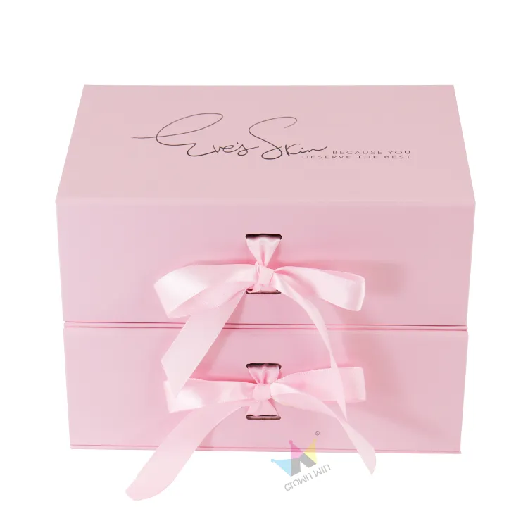 Top down overhead view of closed feminine pink magnetic box with minimalist custom script logo printing