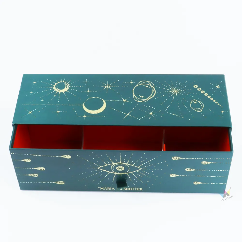 Top-down overhead shot of open wine slide drawer box, removable paper dividers and red contrast interior inside drawer box
