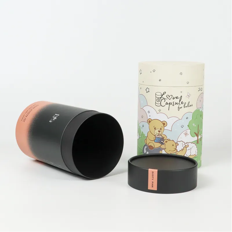 Top overhead flat display of complete dual set cylinder boxes, gradient minimalist tube and pastel cartoon baby gift paper tubes