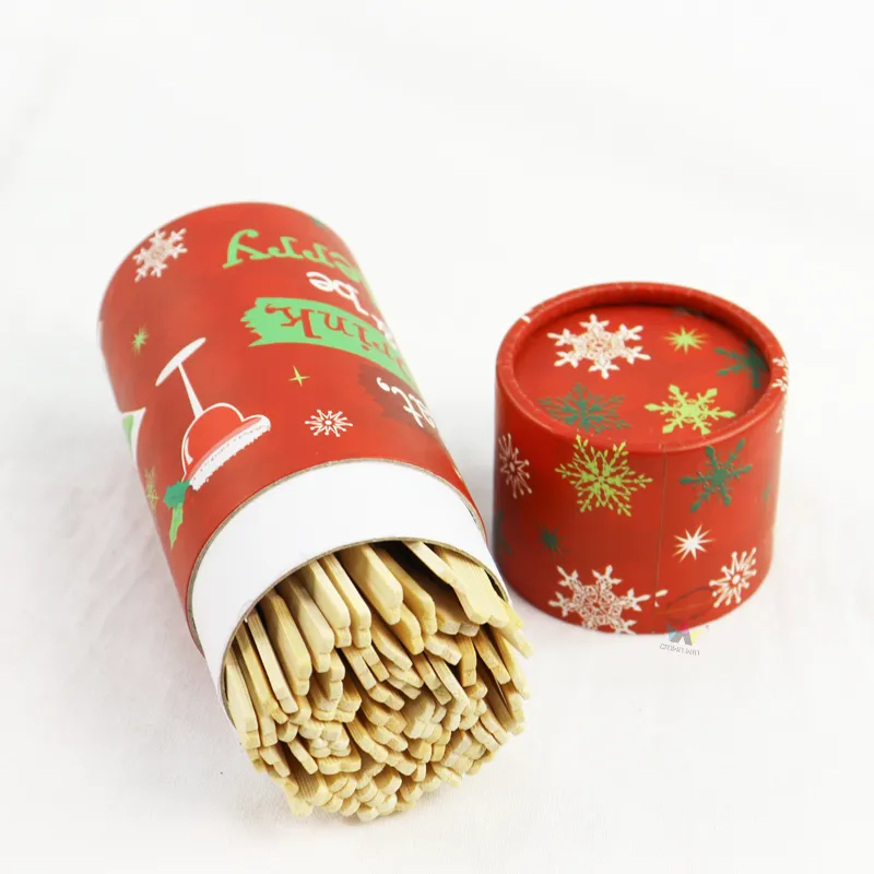 Top view of red Christmas snowflake printed cylinder boxes, round cardboard tube with matching lid