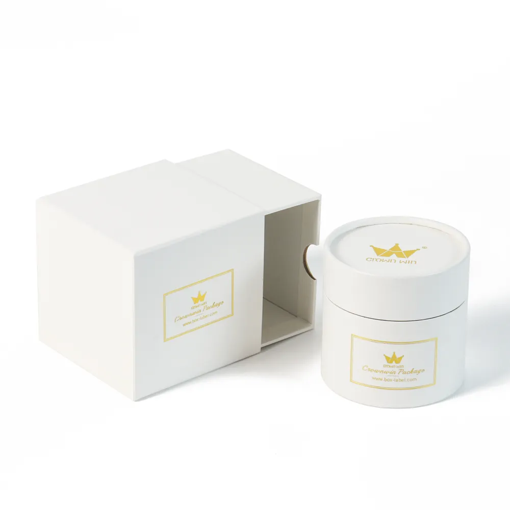 Separated flat lay view of empty rigid slide drawer candle boxes and standalone cylindrical candle tube canister insert