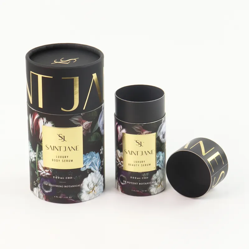 Side profile view of large and small rigid cylinder boxes with full dark vintage floral sleeve printing and metallic gold foil text