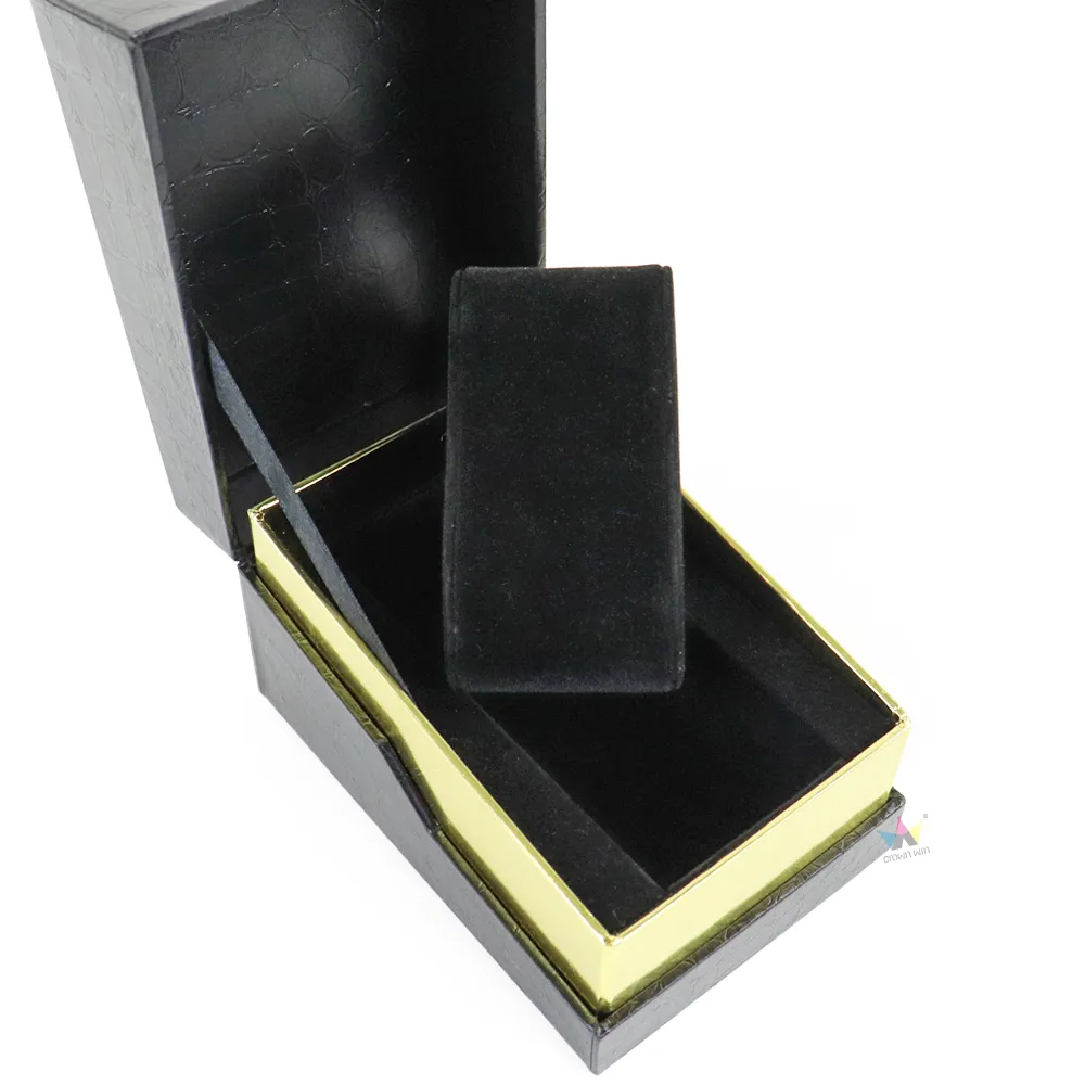 Side angle shot of open flip lid leather essential oil boxes, displaying durable fabric ribbon hinge and full gold wrapped inner tray