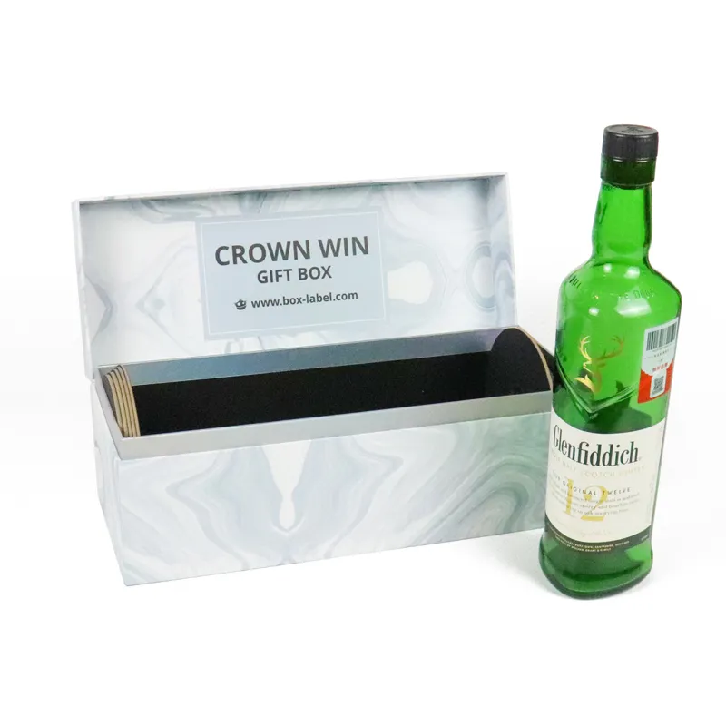 Side angled open magnetic closure boxes showing fully fitted whisky bottle inside foam insert, elegant marble rigid wine packaging