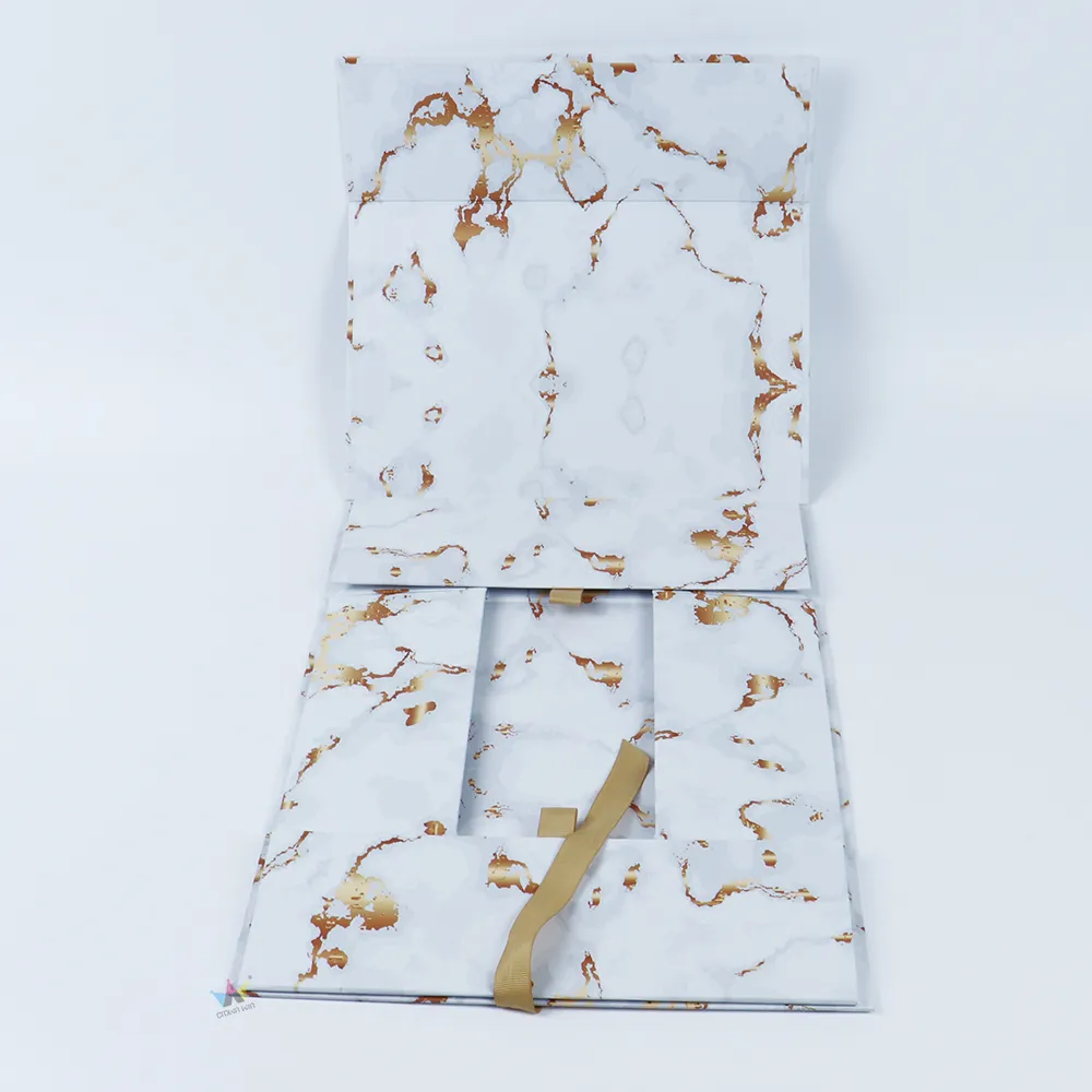 Side open shot of magnetic marble one-piece folding box with full white gold marble printing on inner flip lid