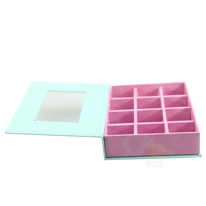 Side open shot of pastel mint magnetic window box packaging displaying removable paper divider and full hollow interior base
