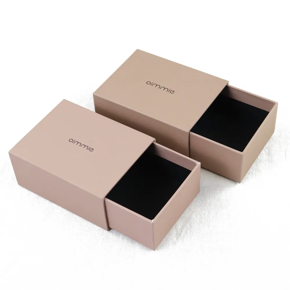Side by side display of long & short nude slide drawer perfume boxes with partially pulled out empty black lined drawers