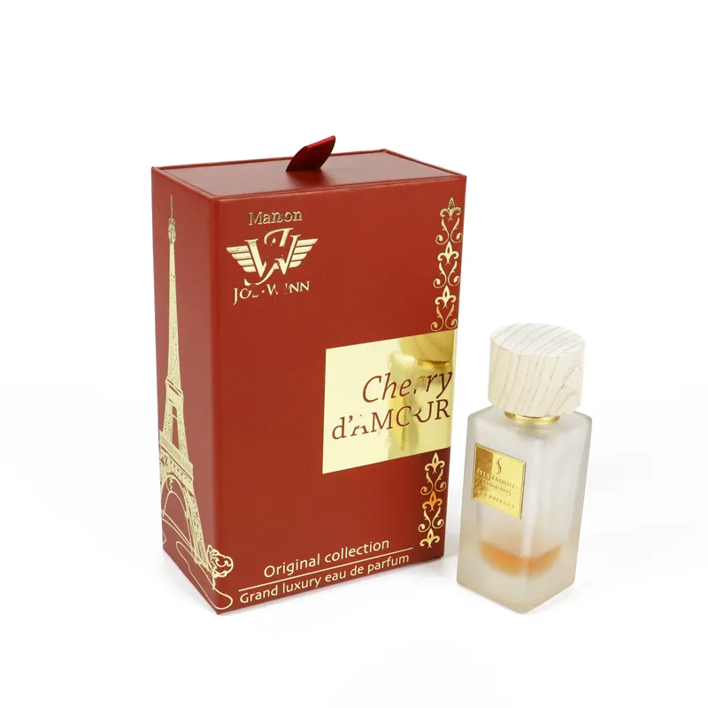 Side-by-side display of red and dark grey gold foil perfume boxes, slide drawer pulled out with matching perfume bottle inside