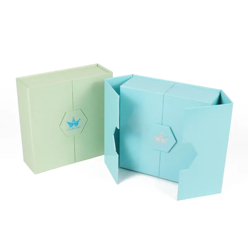 Partially opened sky blue double door box showing symmetrical dual side opening flaps, minimalist matte skincare gift box structure
