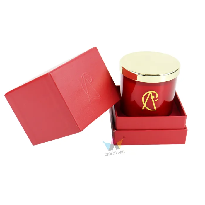 Complete display of red lid & base candle packaging box with matching red glass gold-lid scented candle seated in inner tray
