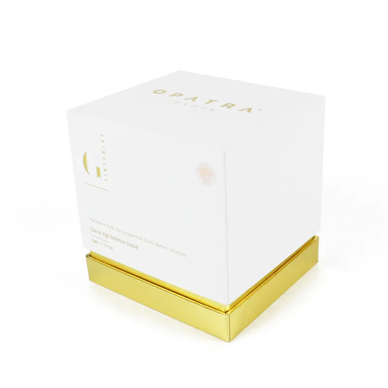 Three-quarter standing perspective of square luxury white-gold skincare gift box specially designed for caviar anti-aging cream jars