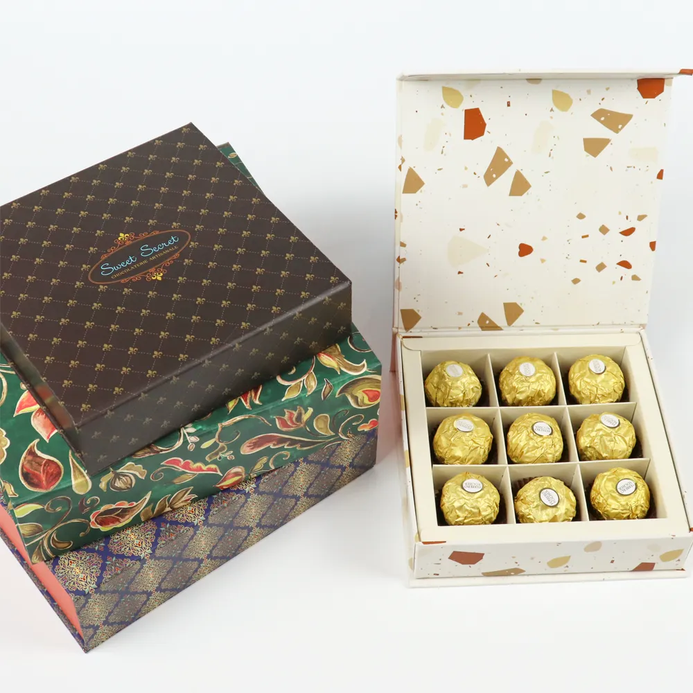 Three vintage patterned rigid magnetic boxes stacked vertically beside open flip lid magnetic chocolate gift box with segmented paper insert