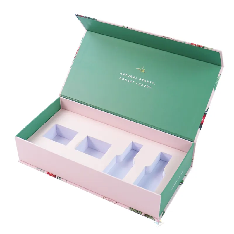 Three-quarter open shot of luxury magnetic skincare packaging showing solid green inner lid lining with printed brand slogan