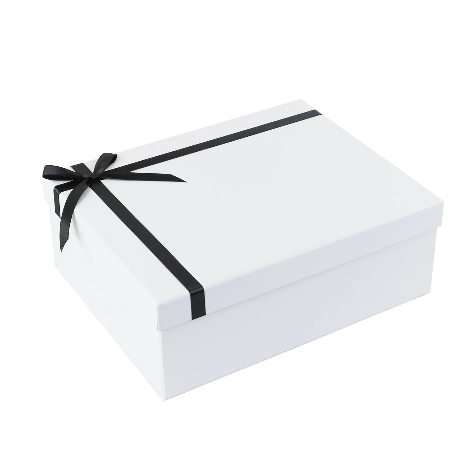 Three-quarter angled product shot of minimalist matte white lid and base box with black satin ribbon bow decoration