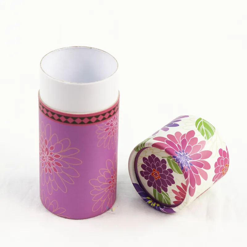 Vertical presentation of empty cylinder box base and matching flower print lid side by side