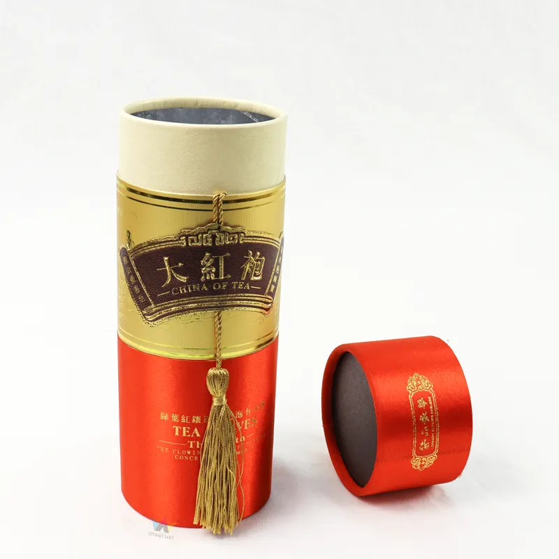 Luxury custom cylinder tea packaging tube box red satin fabric with gold tassel for oolong tea gift