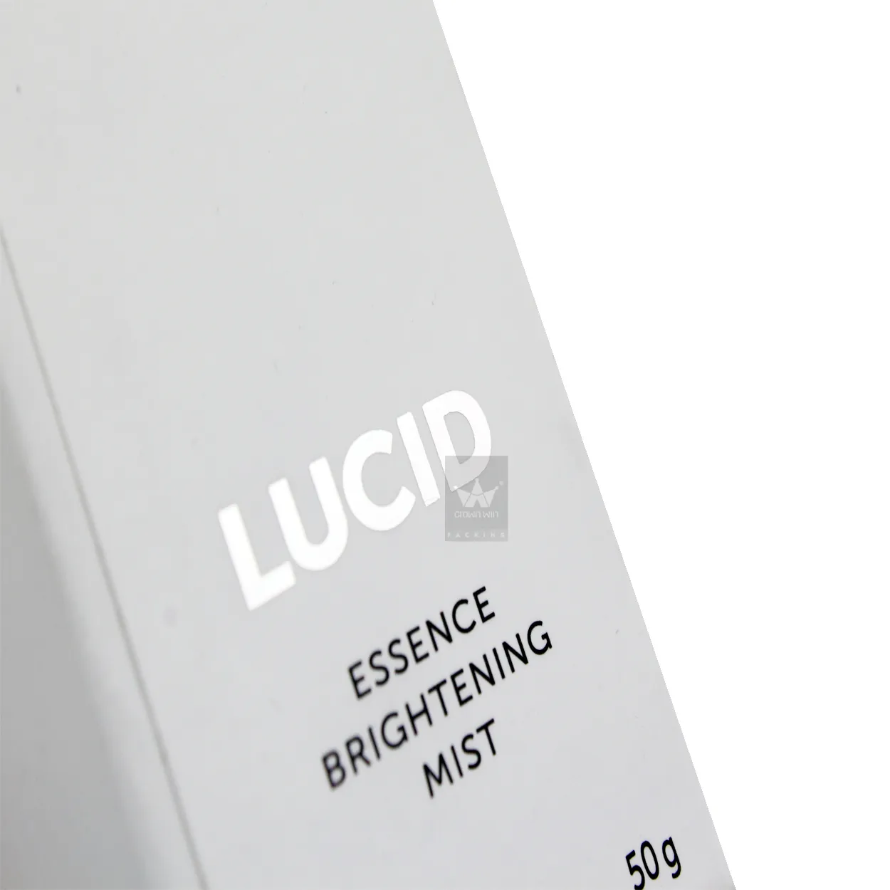 Detail shot of custom printed logo and product text on matte sliding drawer skincare packaging box