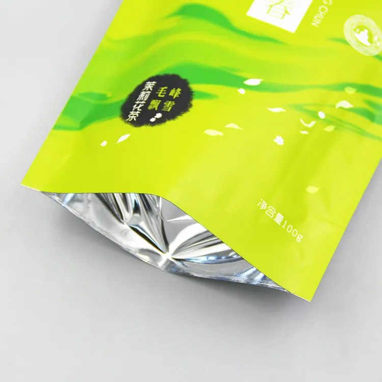 Custom tea packaging stand up pouch showing aluminum foil inner liner for loose leaf tea storage