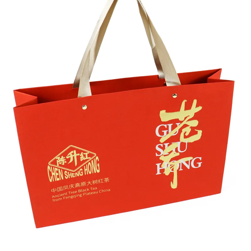 Custom luxury tea packaging red paper gift bag with gold foil logo for black tea gift set
